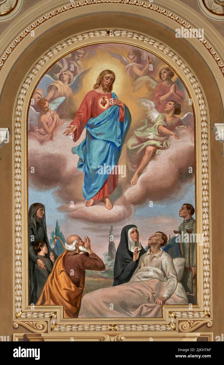 Il Sacro Cuore di Gesù protegge gli ammalati - affresco - Cesare Secchi - 1927 - S.Rocco al Porto (Lo), Italia, chiesa parrocchiale di S. Rocco Banque D'Images