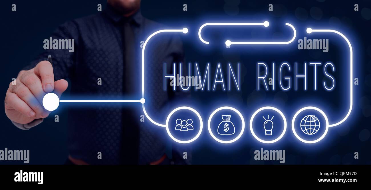 Signature manuscrite droits de la personne. Photo conceptuelle principes moraux normes normes d'une démonstration protégée par la loi homme d'affaires tenant Pen et présentant Banque D'Images