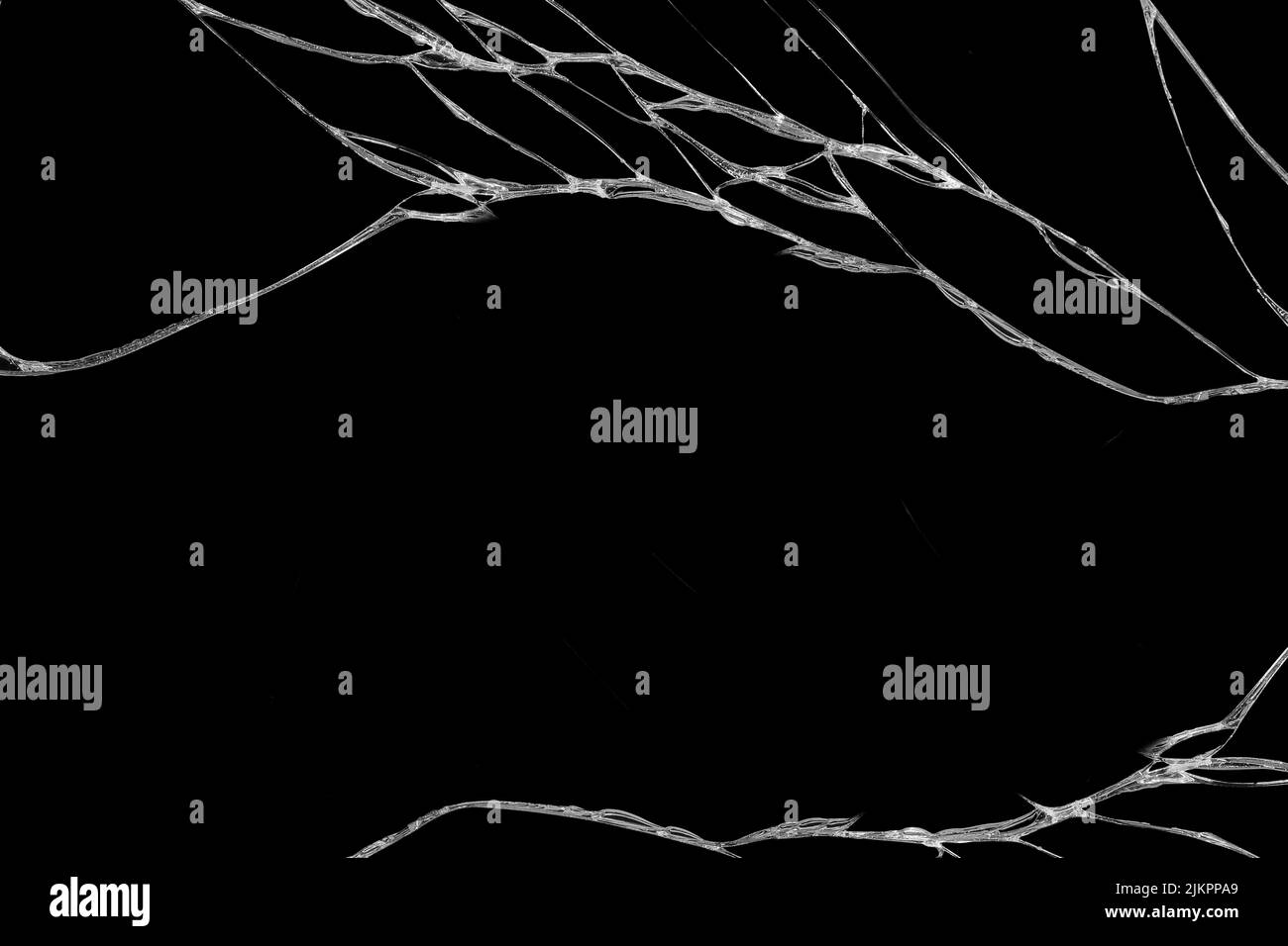 Art de rides et des fissures de verre causés par smashing et relevant les bosses. isolé sur fond noir Banque D'Images