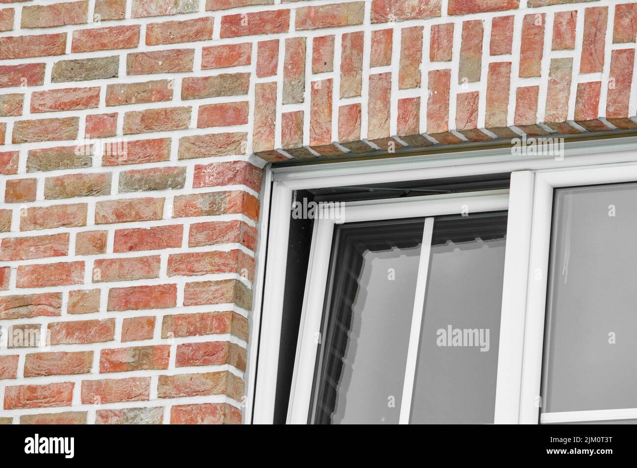 Les détails du toit de la maison de la brique rouge Banque D'Images