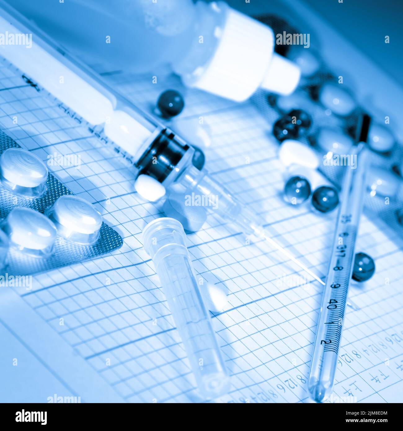 Seringue de jauge de température de la pilule de fond médical Banque D'Images