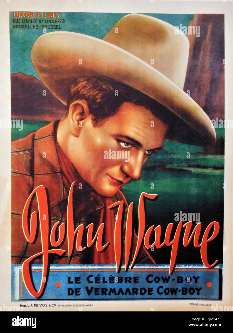 JOHN WAYNE Portrait en tant que cow-boy 1945 affiche belge pour Luxor films Banque D'Images