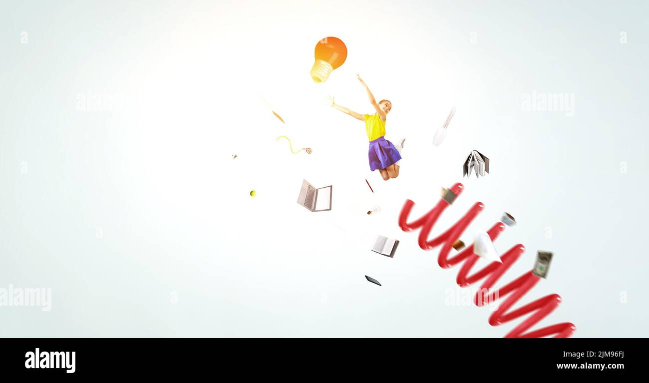 Les enfants sautent dans le ciel Banque D'Images