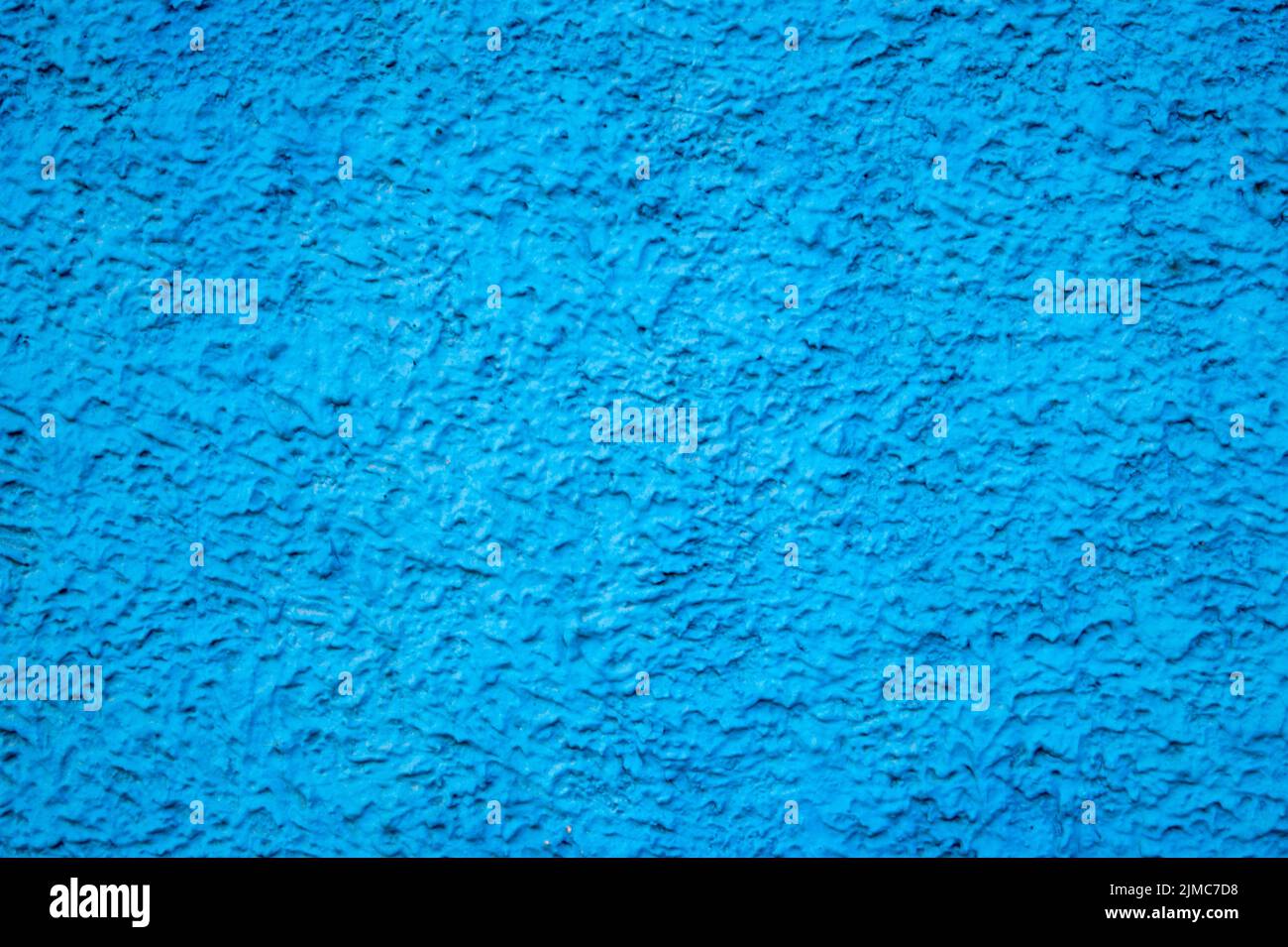 Texture du mur en béton avec plâtre décoratif - photo. La couleur est le bleu. Banque D'Images
