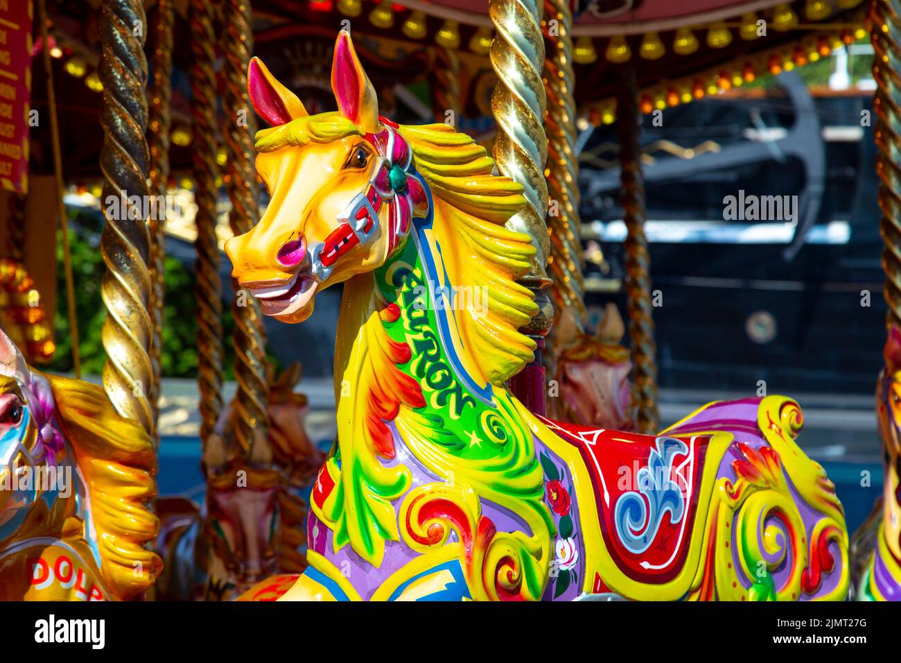 Cheval coloré sur un carrousel (Greenwich, Londres, Royaume-Uni Banque D'Images