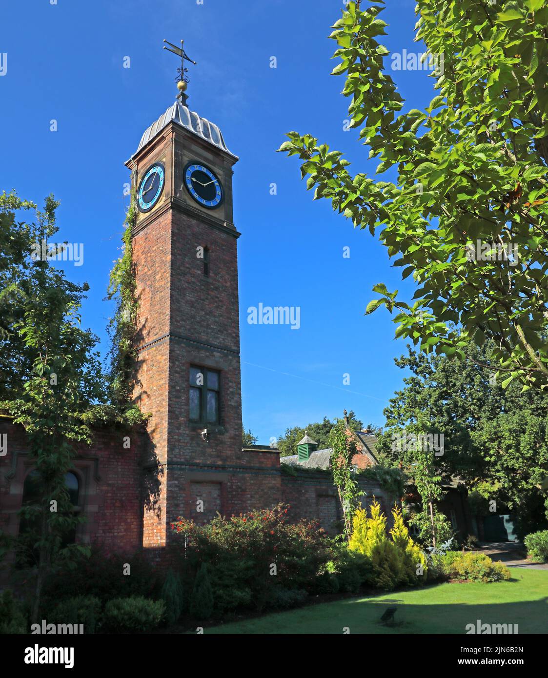 Clocktower à Walton Hall, maison de campagne à Walton Gardens Park, Warrington, Cheshire, Angleterre, Royaume-Uni Banque D'Images