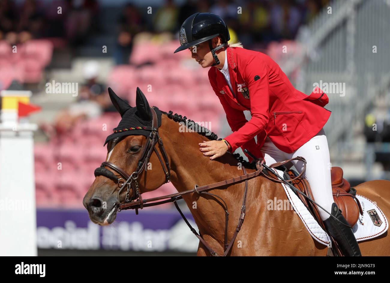 Herning, Danemark. 10th août 2022. Sports équestres: Championnat du monde, saut de spectacle. Voir le cavalier Jana Wargers (Allemagne) passe à Limbridge. Credit: Friso Gentsch/dpa/Alay Live News Banque D'Images