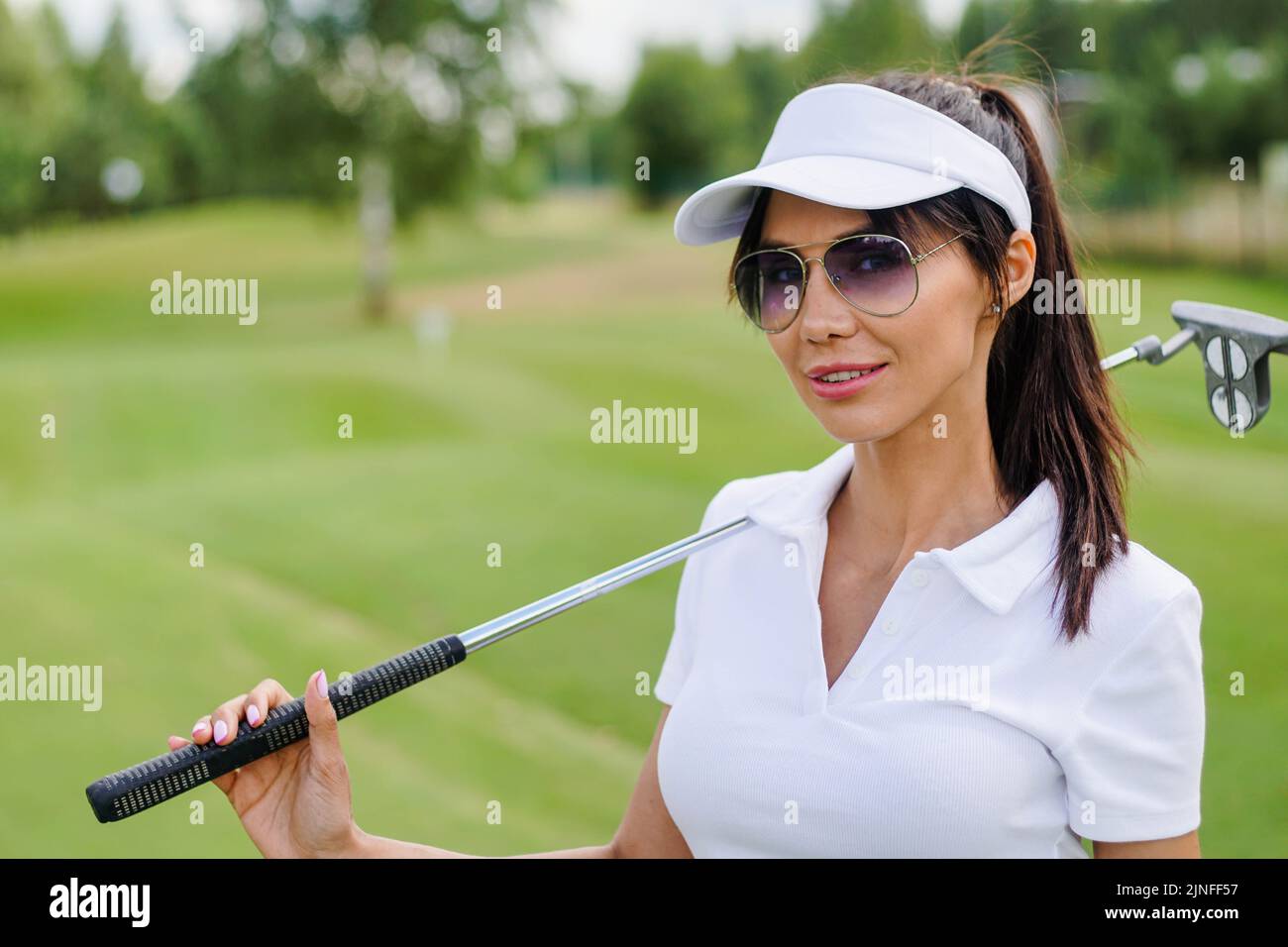 Female hand and golf club Banque de photographies et d'images à haute  résolution - Alamy