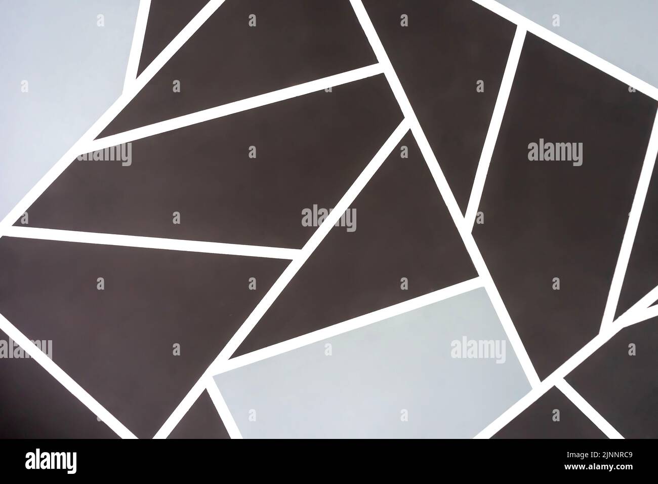 Arrière-plan abstrait de formes géométriques marron et grise. Banque D'Images