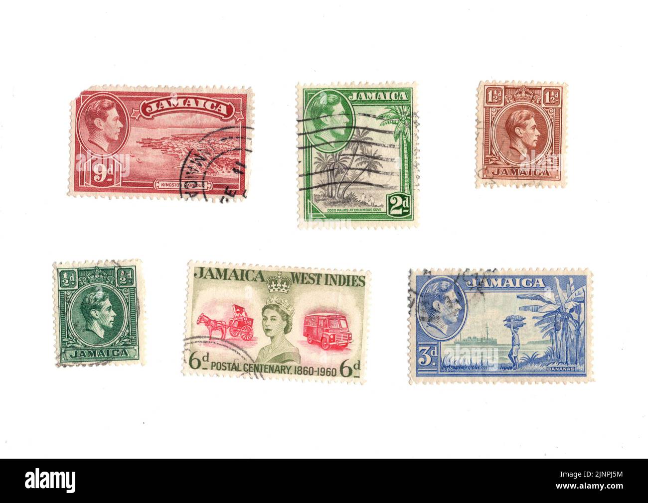 Une sélection de vieux timbres-poste de Jamaïque sur fond blanc. Banque D'Images