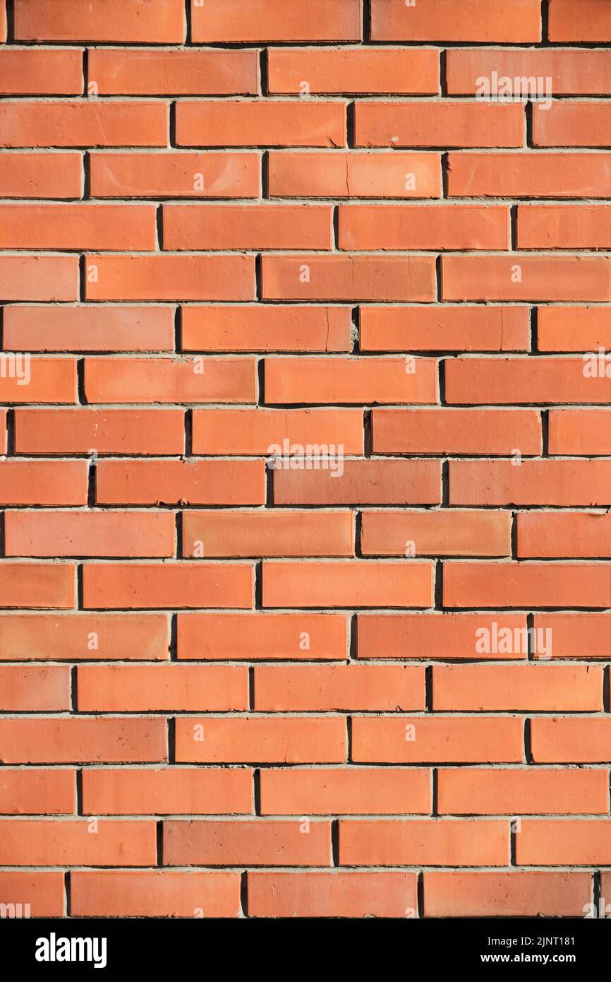 Arrière-plan, texture d'un mur de briques rouges Banque D'Images