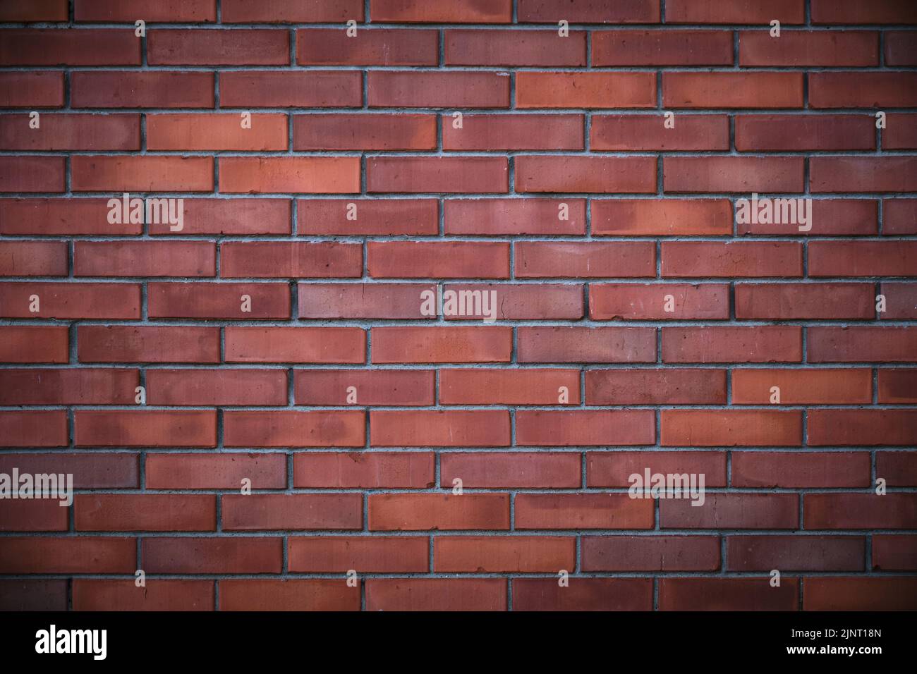 Arrière-plan, texture d'un mur de briques rouges Banque D'Images