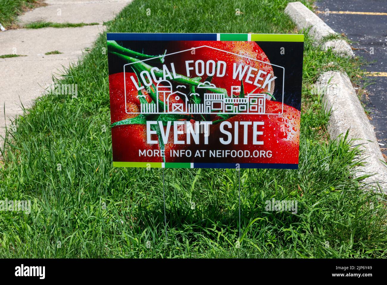 Un panneau dans l'herbe marque cet emplacement comme un site local de la semaine de l'alimentation à fort Wayne, Indiana, États-Unis. Banque D'Images