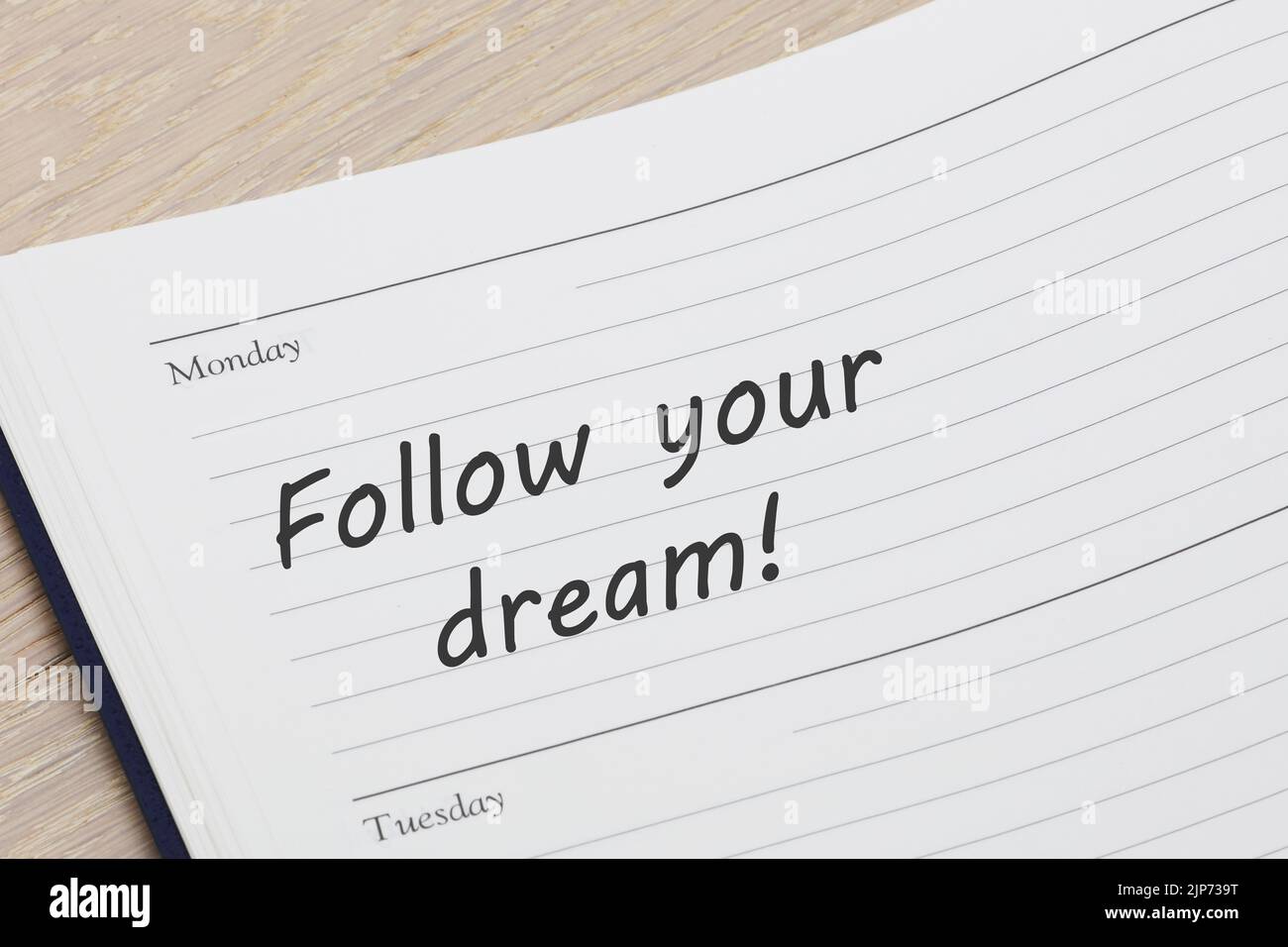 Suivez votre agenda de rêve rendez-vous de rappel ouvert sur le bureau Banque D'Images