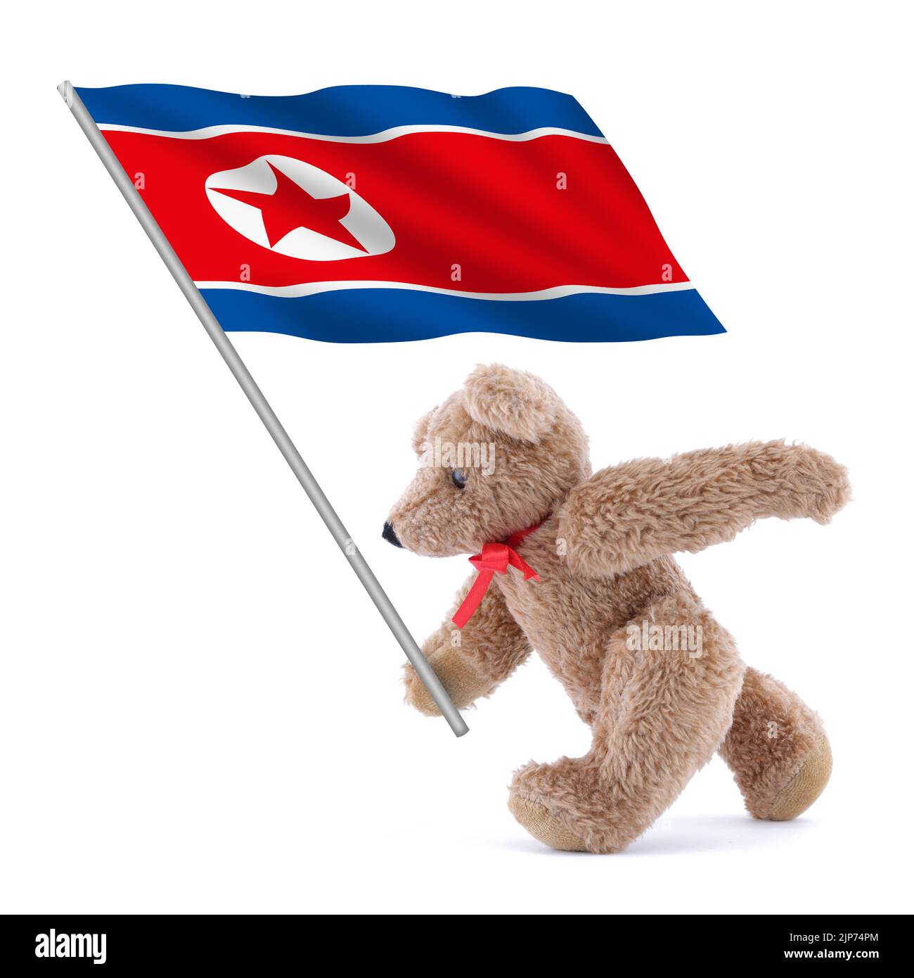 Drapeau nord-coréen porté par un adorable ours en peluche Banque D'Images