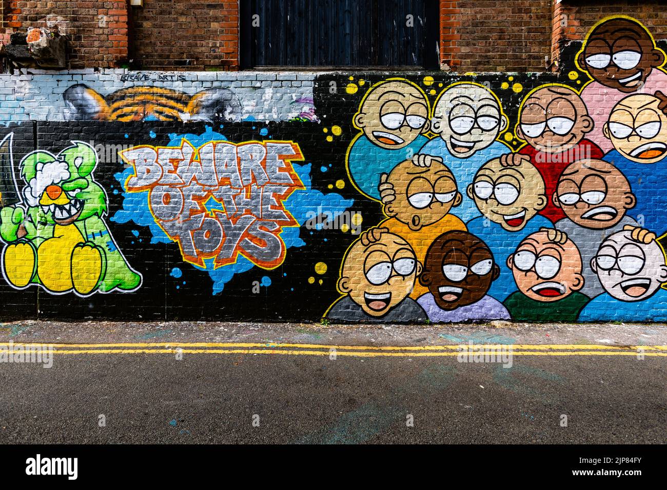Un gros plan de graffiti sur un mur à Trafalgar Lane, Brighton, Angleterre Banque D'Images