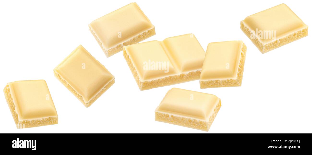 Morceaux de chocolat au lait blanc isolés sur fond blanc Banque D'Images