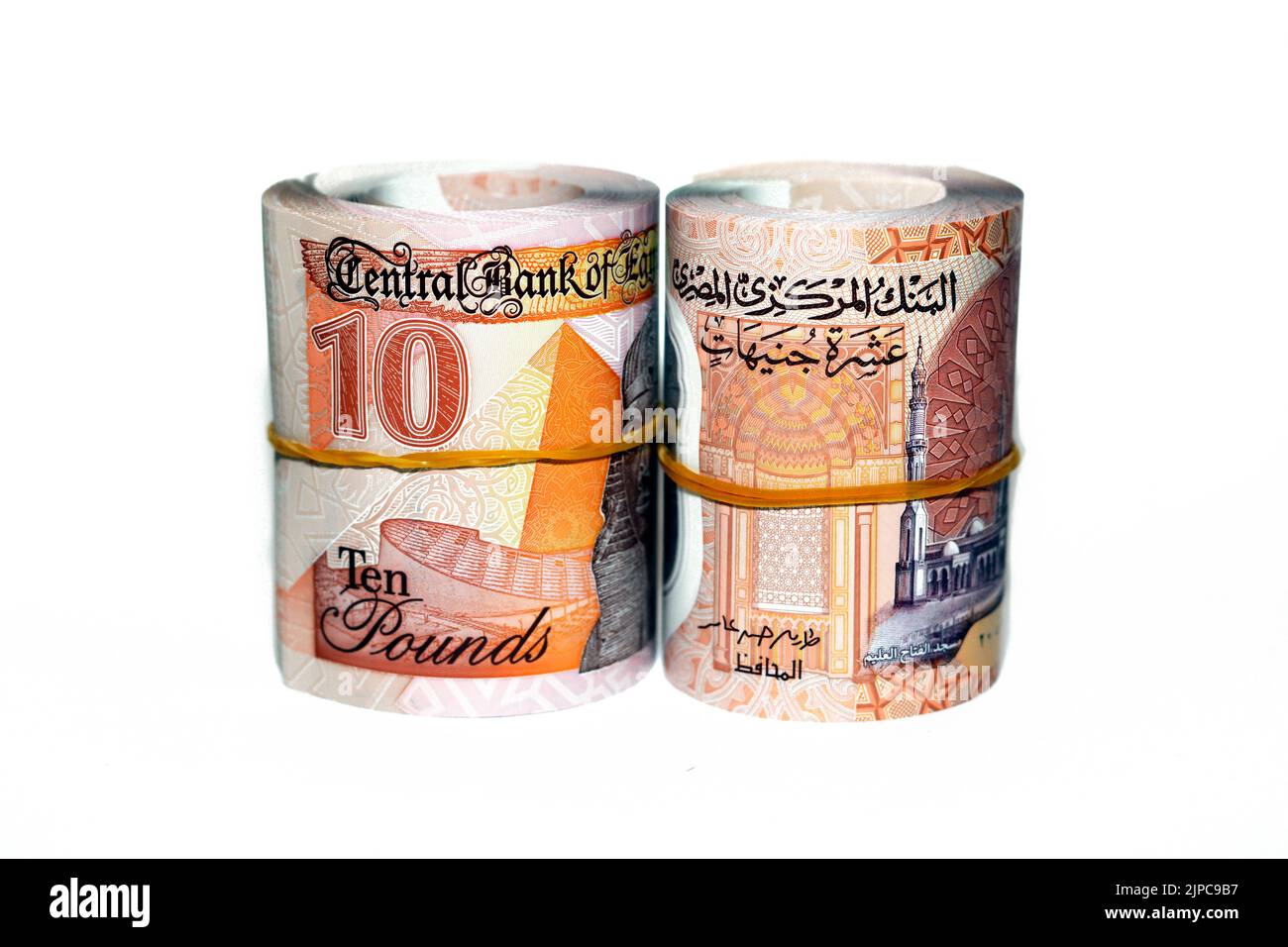 Égypte rouleaux d'argent de la nouvelle première égyptienne 10 LE EGP dix livres plastique polymère billet de banque isolé sur fond blanc, livres égyptiennes billets d'argent liquide r Banque D'Images
