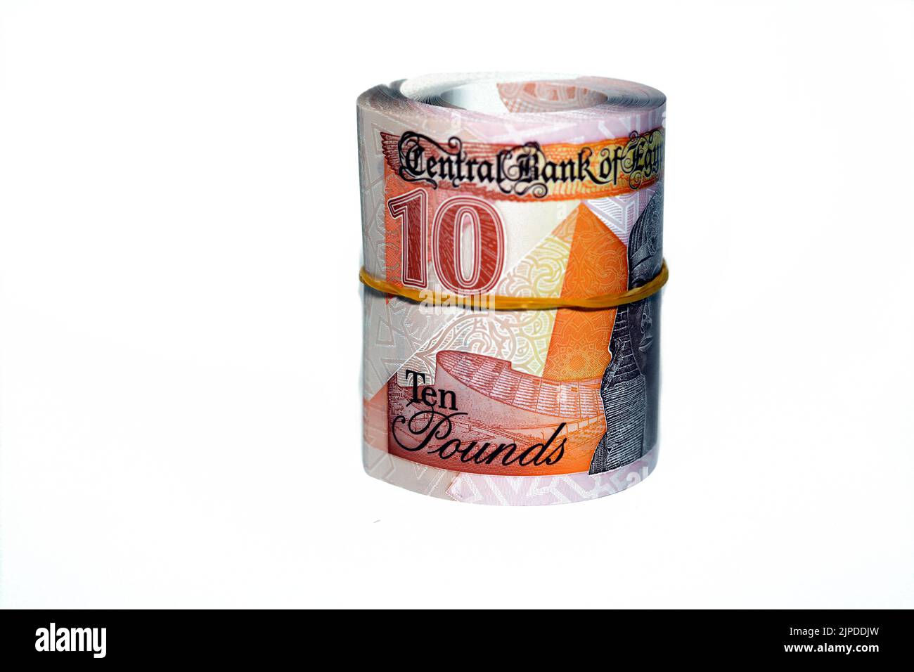 Égypte rouleau d'argent du nouveau premier égyptien 10 LE EGP dix livres plastique polymère billet isolé sur fond blanc, livres égyptiennes monnaie billets ro Banque D'Images