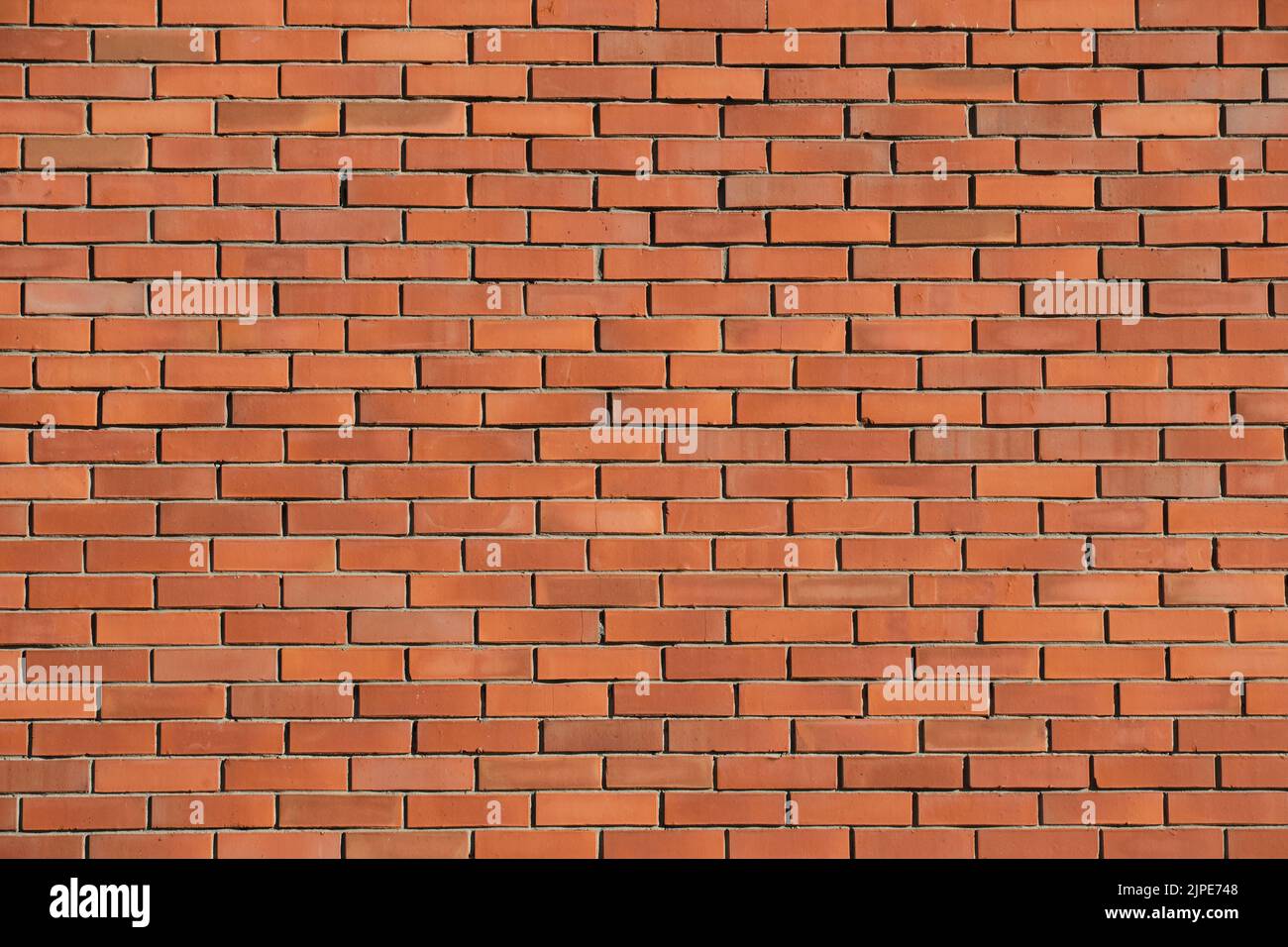 Arrière-plan, texture d'un mur de briques rouges Banque D'Images