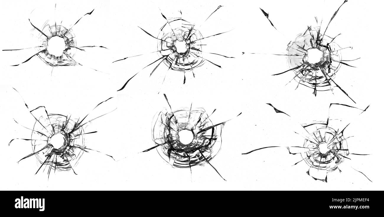 trous de balle dans le verre isolés sur fond blanc Banque D'Images