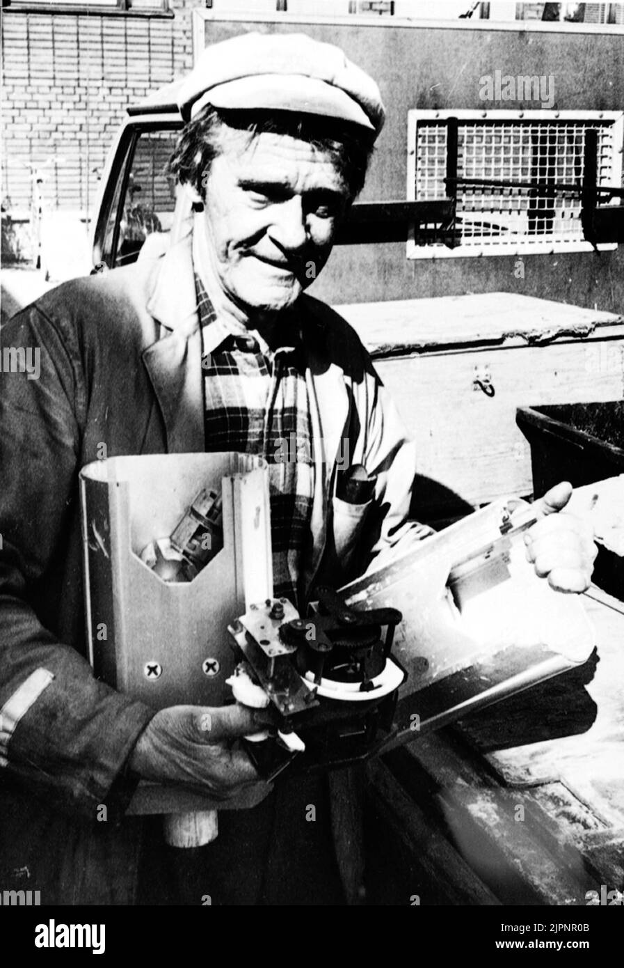 Vidange de la machine de stationnement. Tömning av parkeringsautomat. Banque D'Images