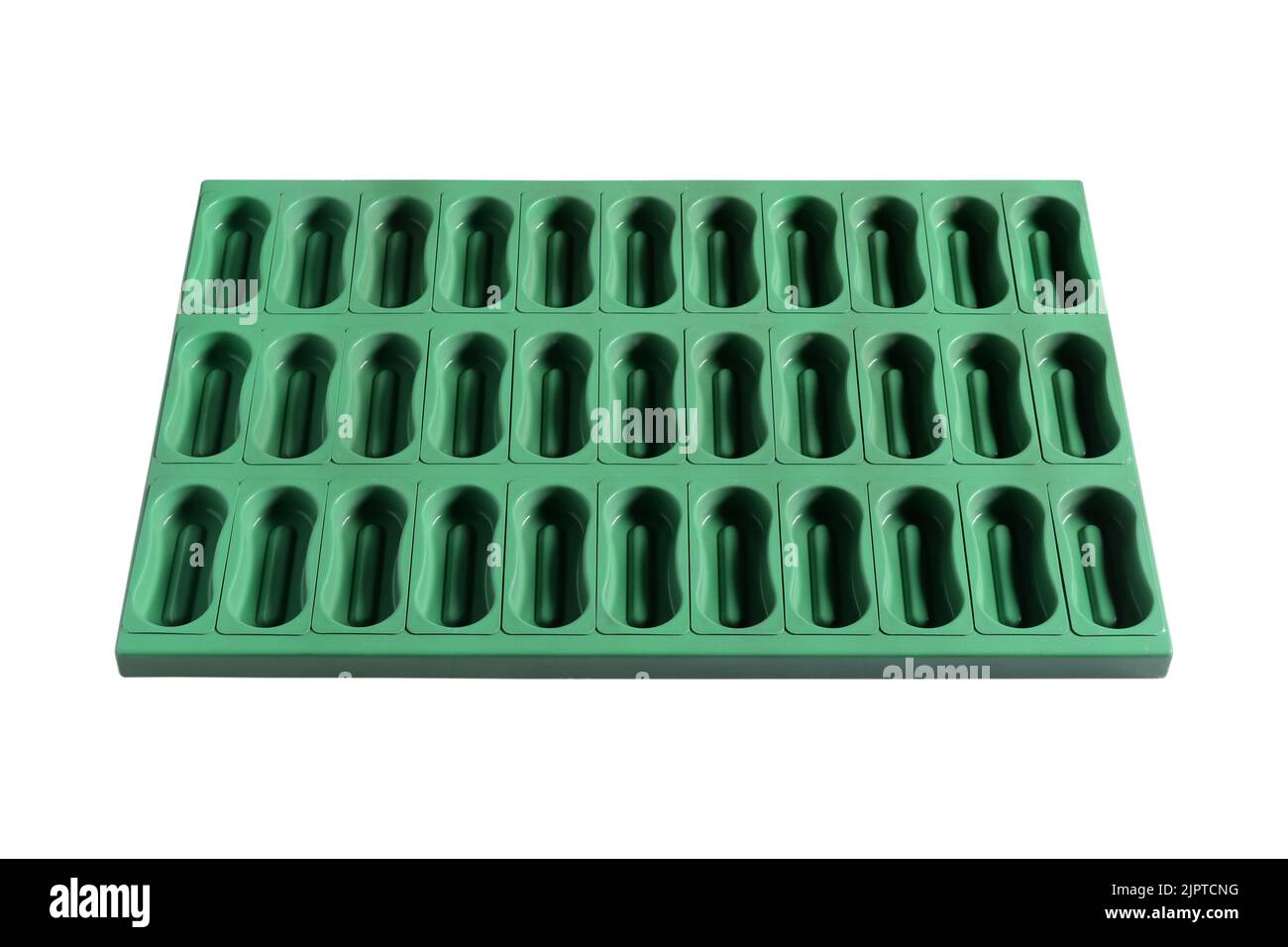Moule à gâteau sur fond blanc. Professions: Pâtisserie. Banque D'Images