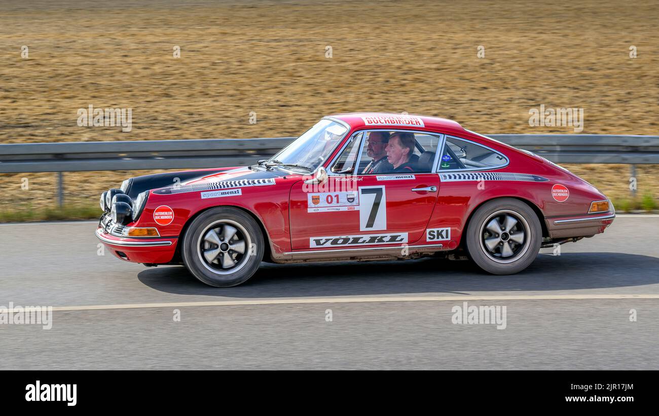 Munich, Allemagne - 13 août. 2022 : Walter Röhrl conduit la Porsche 911 à partir de 1970 Banque D'Images