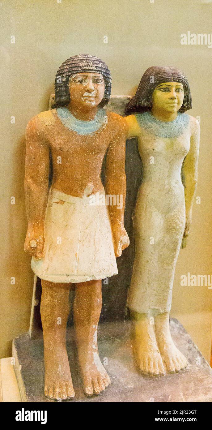 Le Caire, Musée égyptien, double statue d'un homme et de sa femme. Banque D'Images