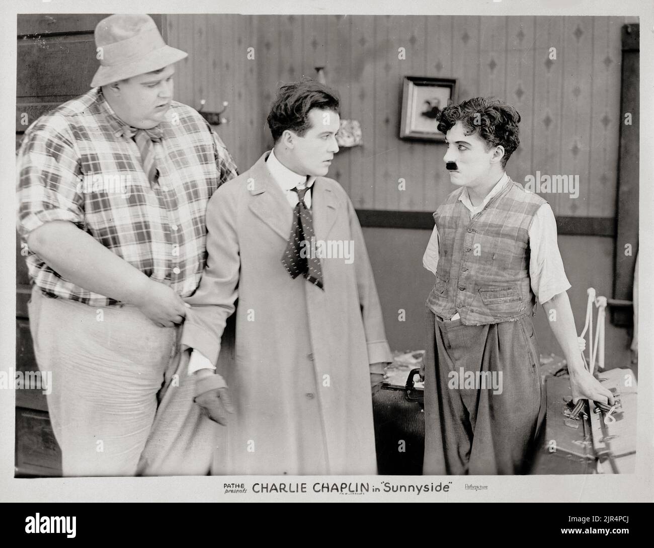 Sunnyside (photo de Pathé, R-1920s). Scène de cinéma avec Charlie Chaplin. Banque D'Images