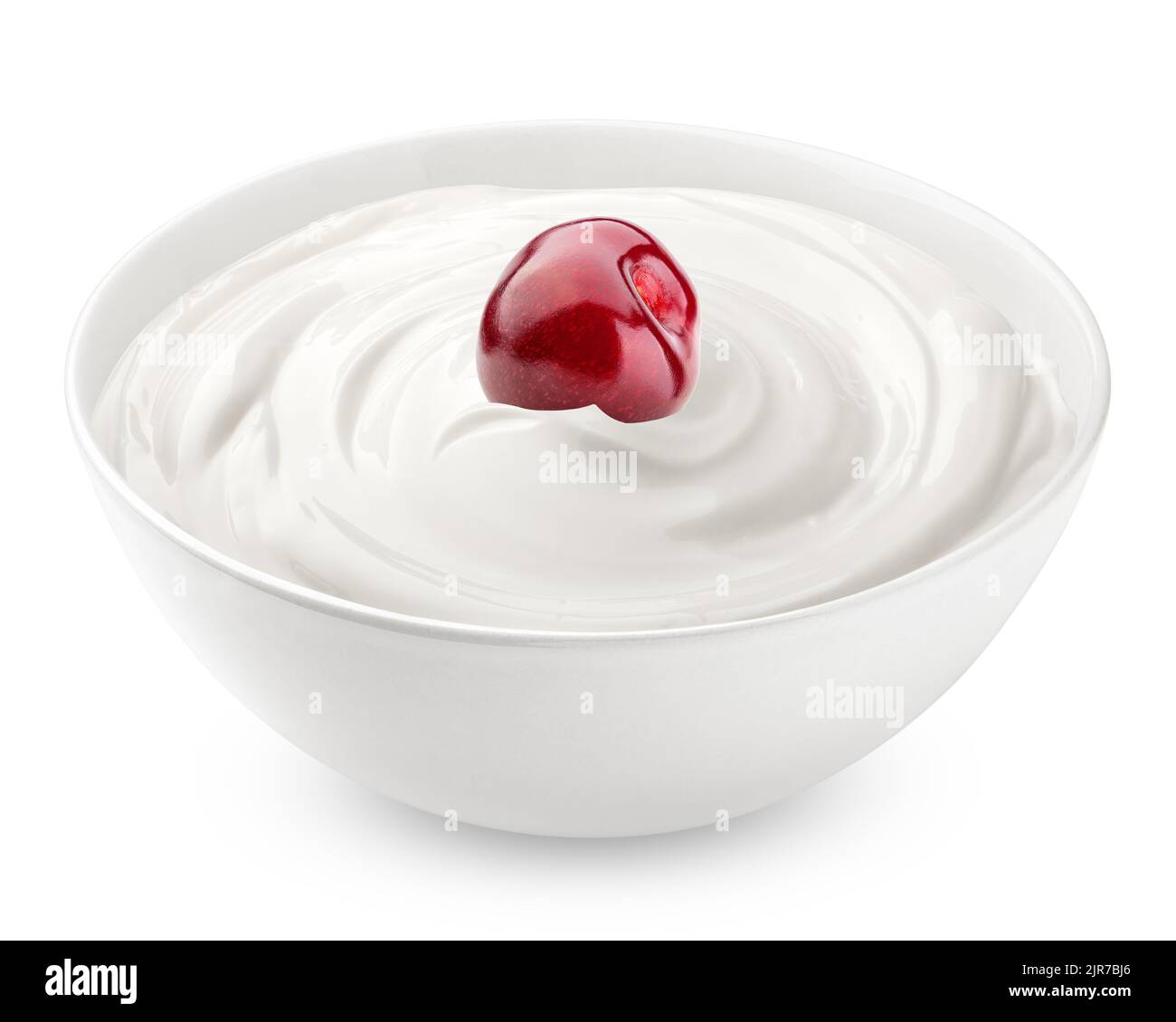 cerise à la crème aigre, yaourt, isolé sur fond blanc, chemin de coupure, profondeur de champ complète Banque D'Images
