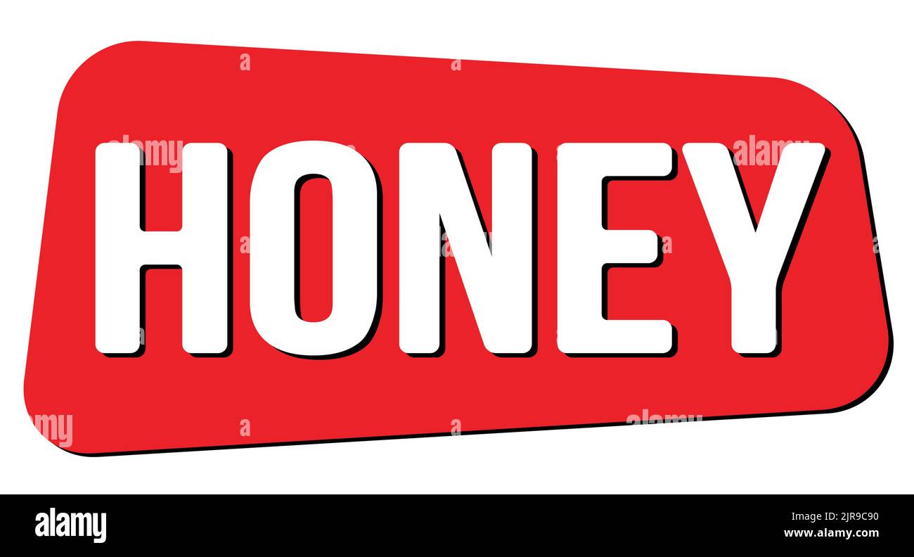 TEXTE EN MIEL inscrit sur l'enseigne rouge en forme de trapèze. Banque D'Images