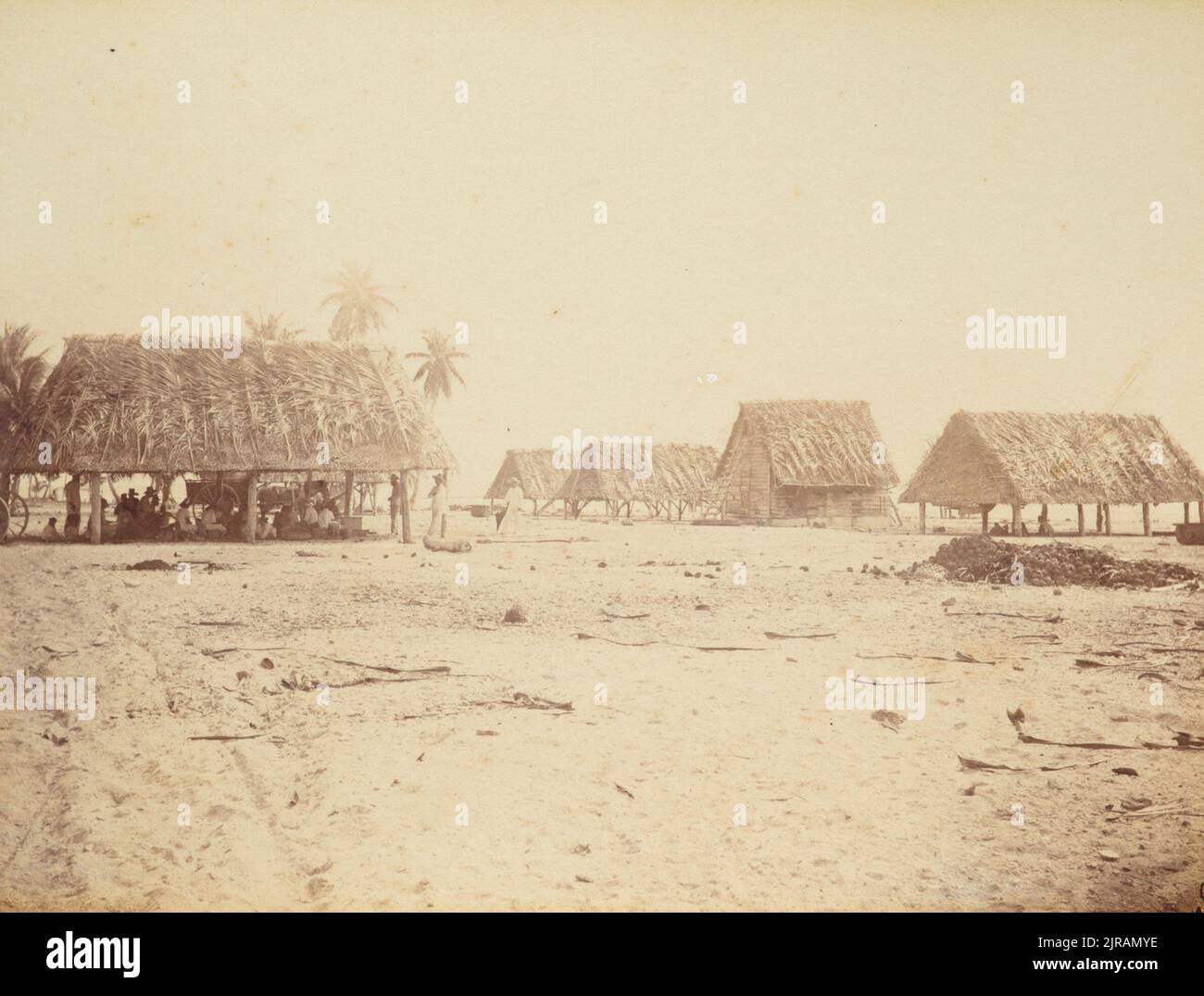 Le coprah assèche les hangars de Swains Island. Tiré de l'album: Views in the Pacific Islands, 1886, Swains Island, par Thomas Andrew. Banque D'Images