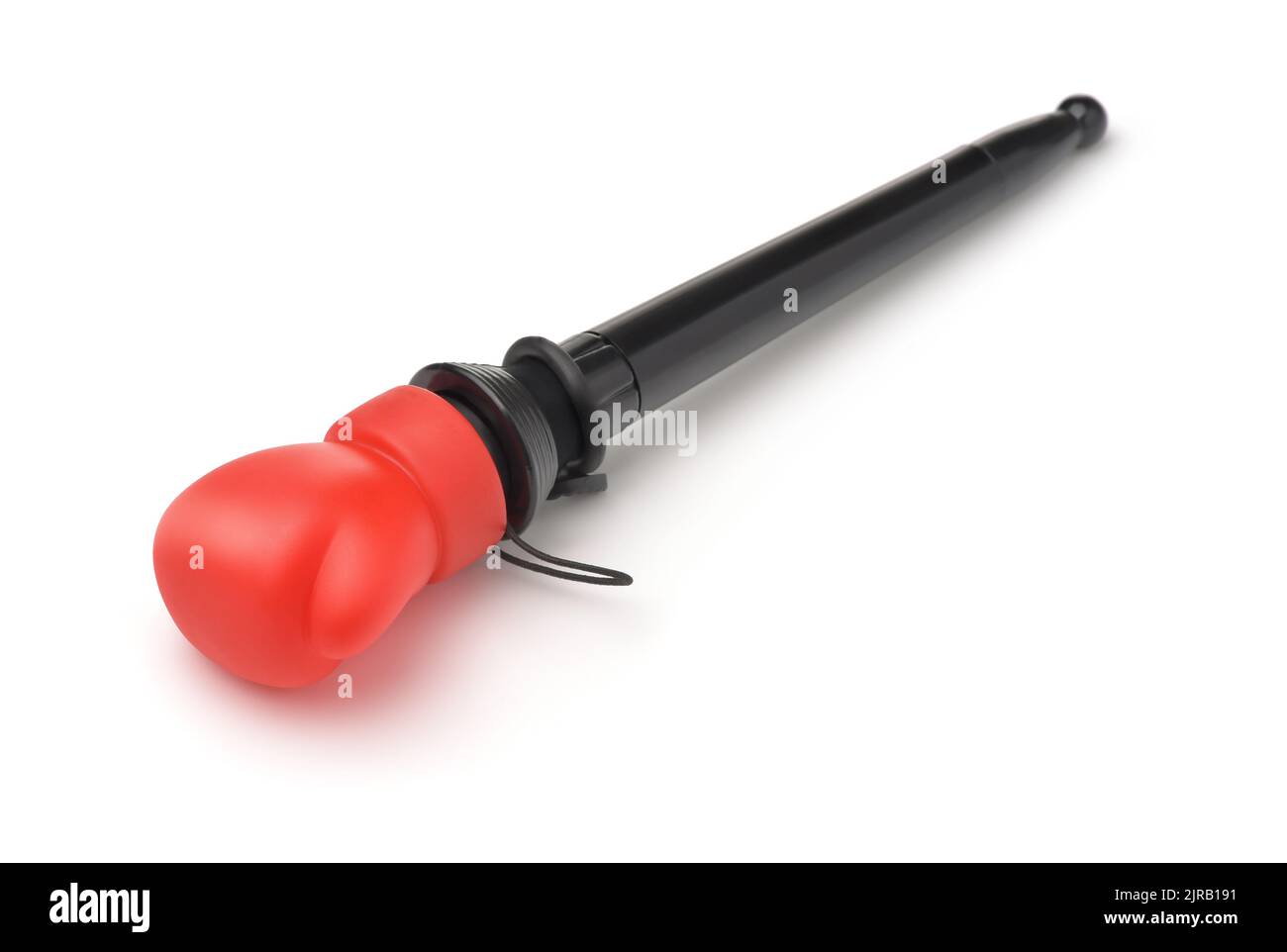 Gant de boxe rouge jouet pop-out isolé sur blanc Banque D'Images