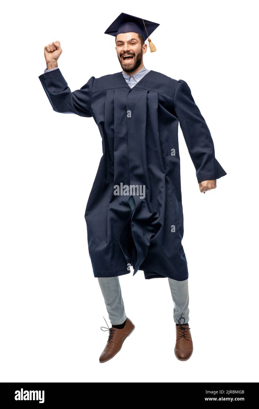 Heureux homme saut étudiant diplômé indien Banque D'Images