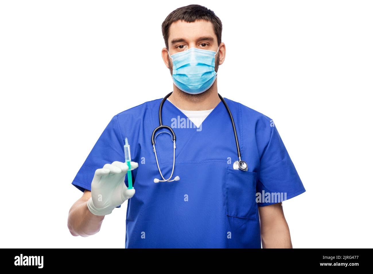 médecin masculin dans un masque et des gants avec une seringue Banque D'Images