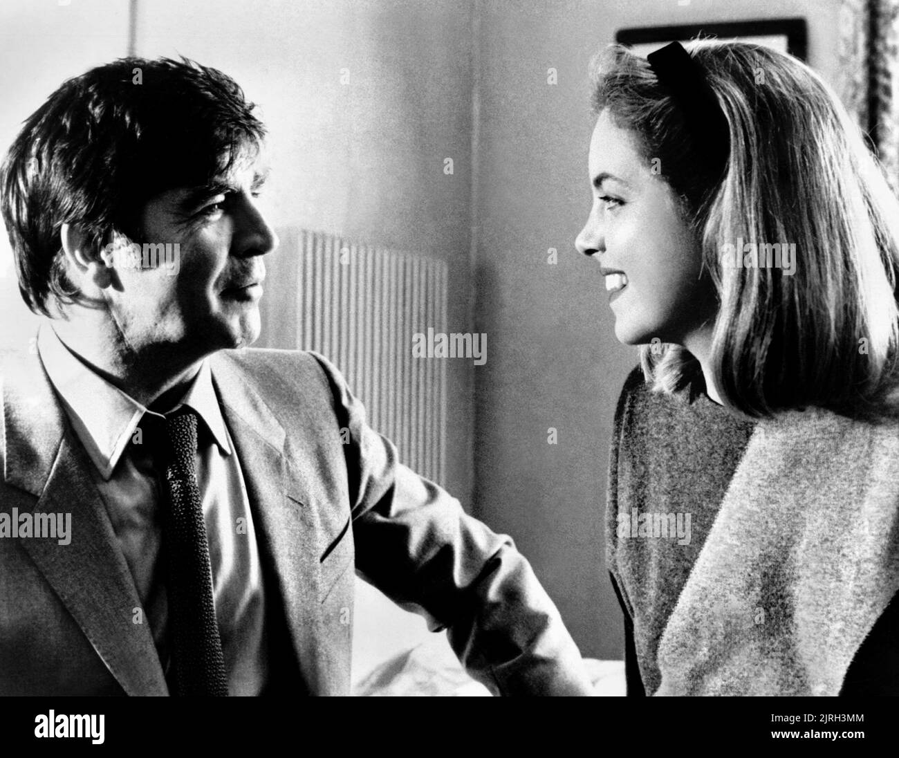 ALAN BATES, GRETA SCACCHI, DR. FISCHER DE GENÈVE, 1985 Banque D'Images