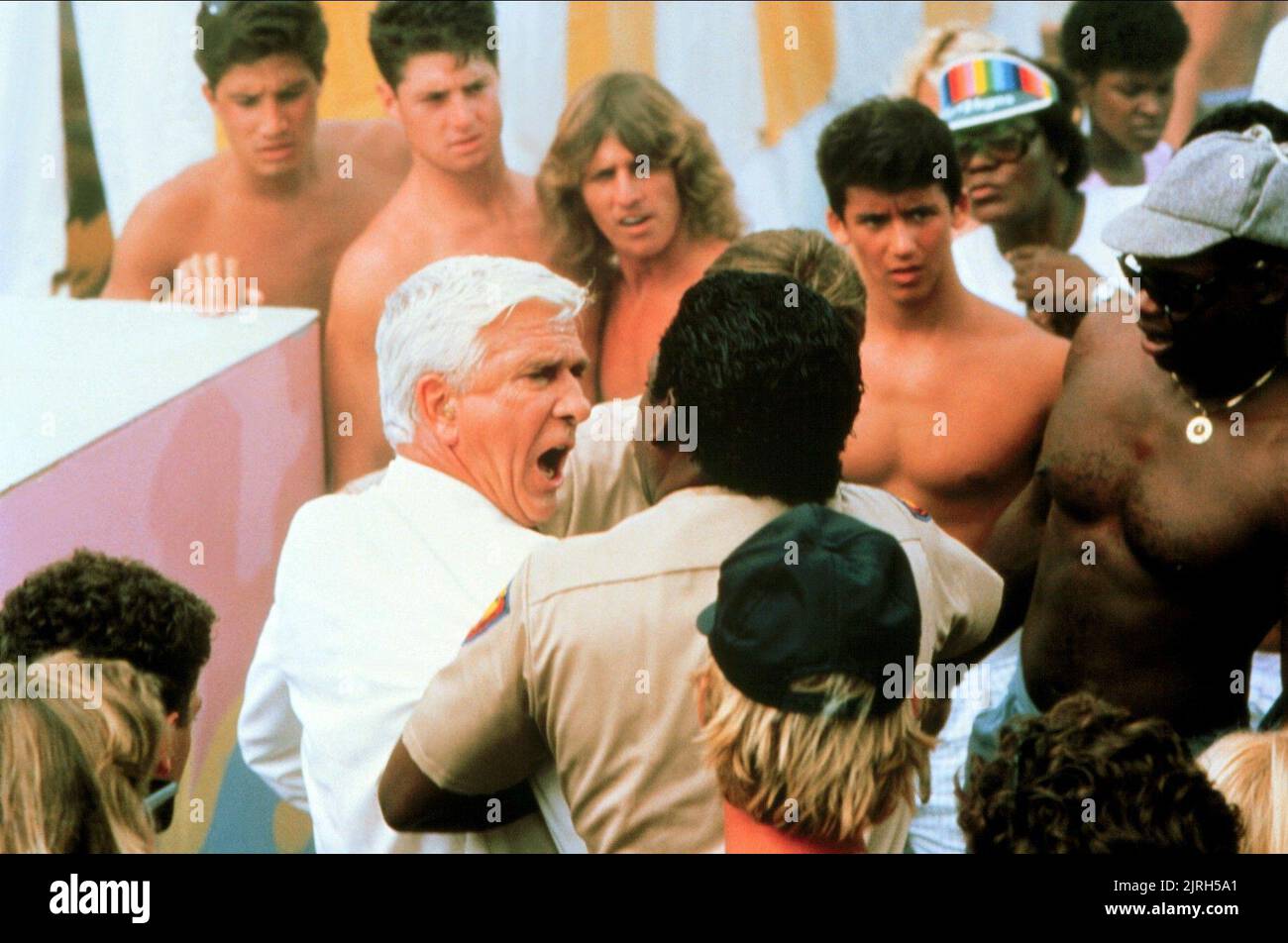 LESLIE NIELSEN, COURBES DANGEREUSES, 1988 Banque D'Images