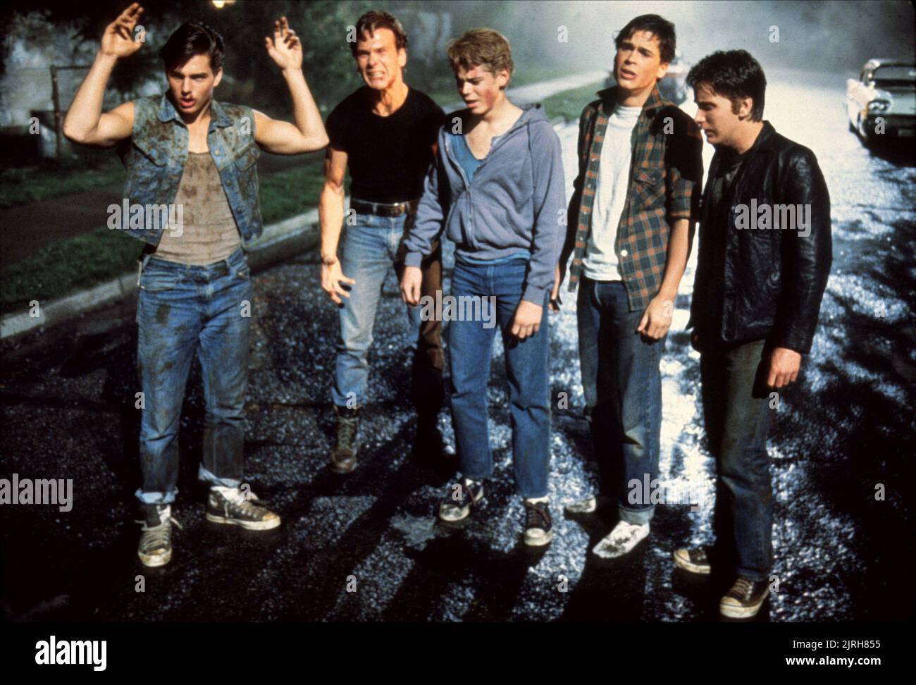 TOM CRUISE, Patrick Swayze, C. Thomas Howell, ROB LOWE, Emilio Estevez, l'extérieur, 1983 Banque D'Images