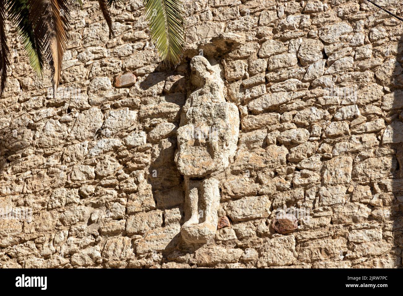 Ciudad Real, Espagne. Silhouette d'un homme sculpté dans les murs de l'Iglesia de San Pedro (église Saint-Pierre) Banque D'Images