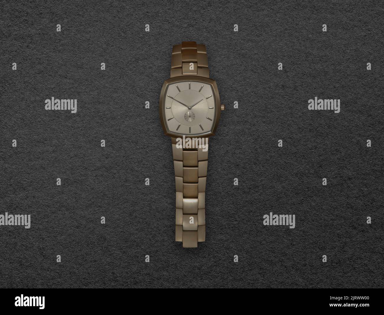 montre-robe or de luxe sur fond gris Banque D'Images