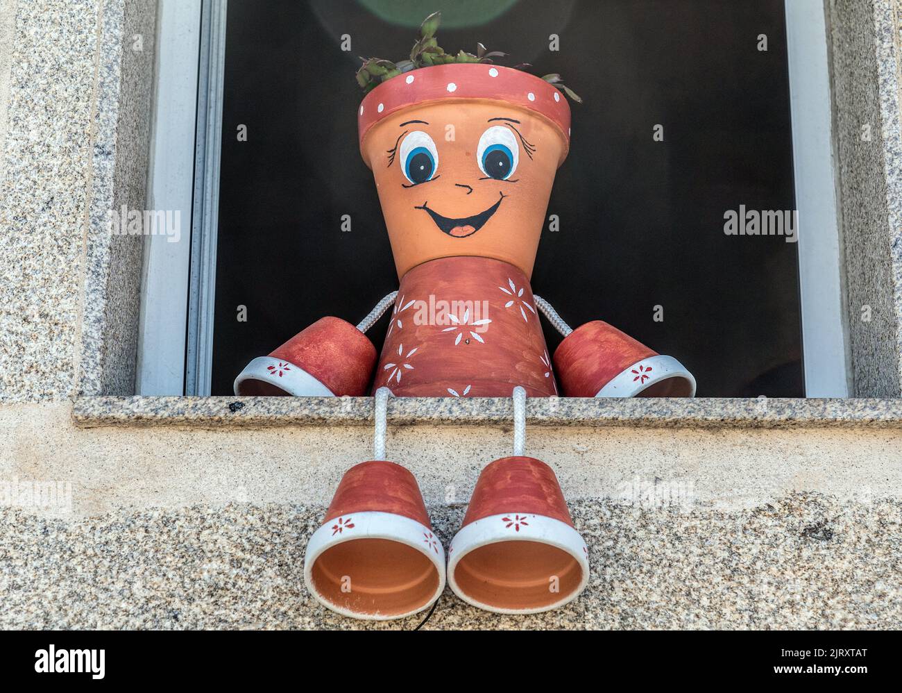 Homme du pot de fleurs sur le Camino de Santiago pèlerinage Espagne Banque D'Images