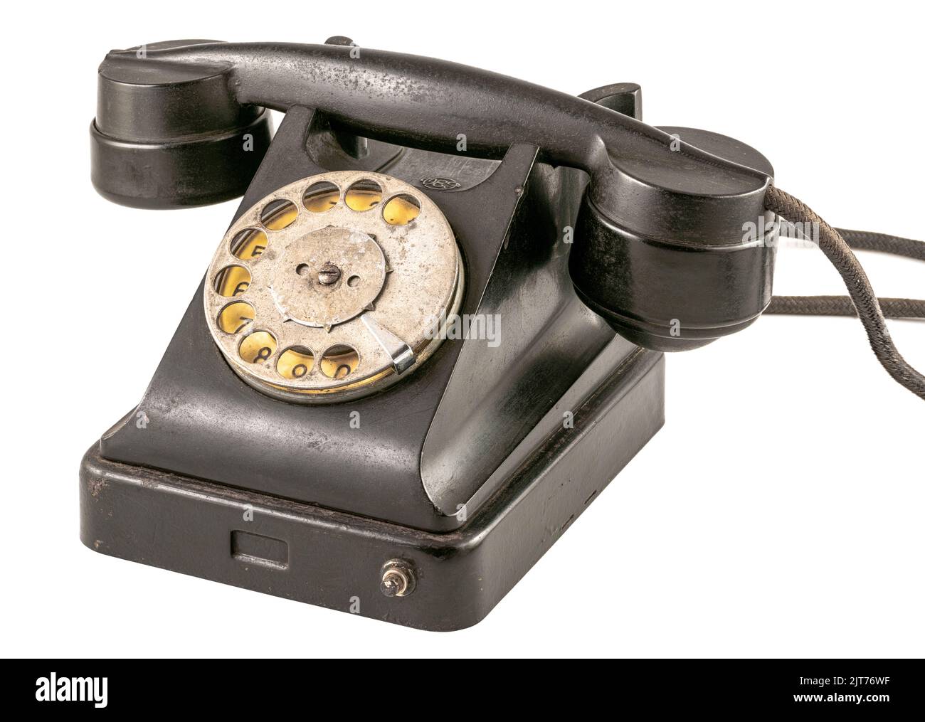 Téléphone disque vintage avec combiné sur fil isolé sur blanc Banque D'Images