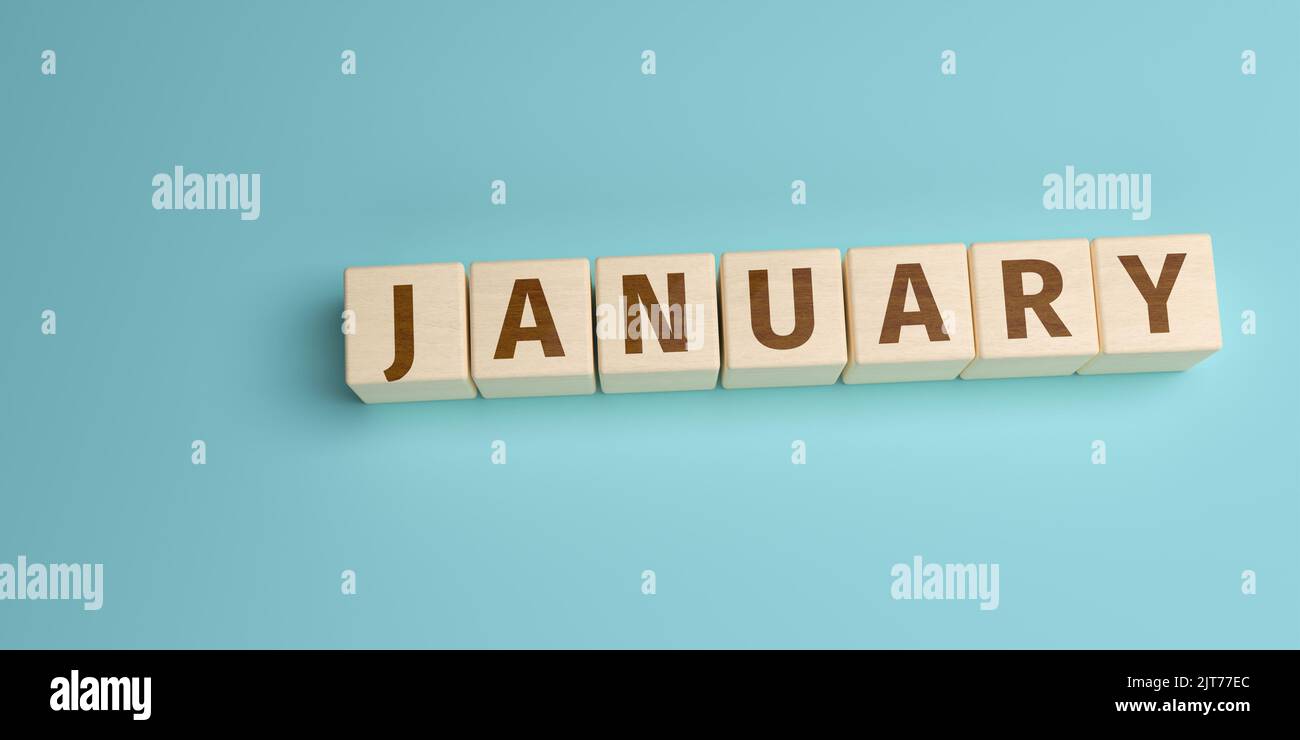 Le mot janvier construit à partir de lettres sur des cubes en bois. Vue grand angle avec espace de copie Banque D'Images