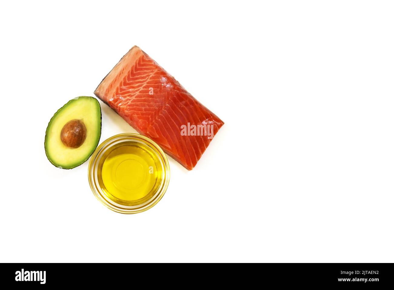 Ingrédients d'aliments sains. Poisson, huile d'olive, avocat. Concept de régime à faible teneur en glucides cétogènes. Banque D'Images