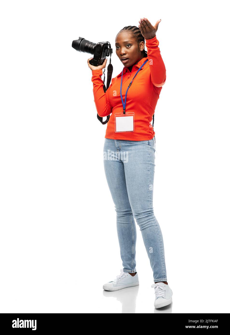 femme photographe avec caméra et id de conférence Banque D'Images