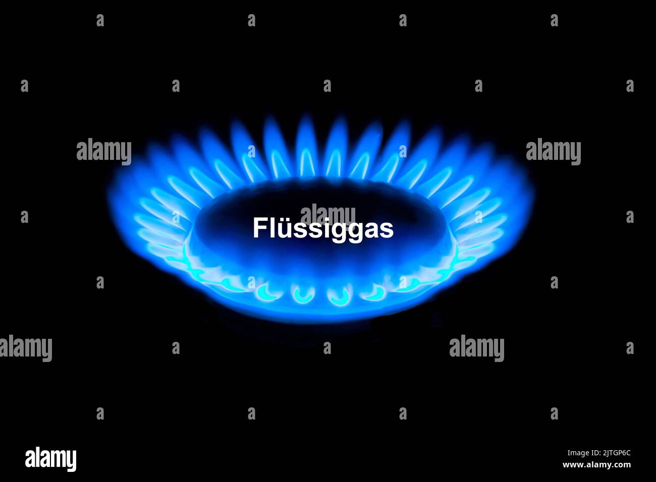 Flamme de gaz d'une cuisinière avec le mot Fluessiggas, gaz liquide, Allemagne Banque D'Images