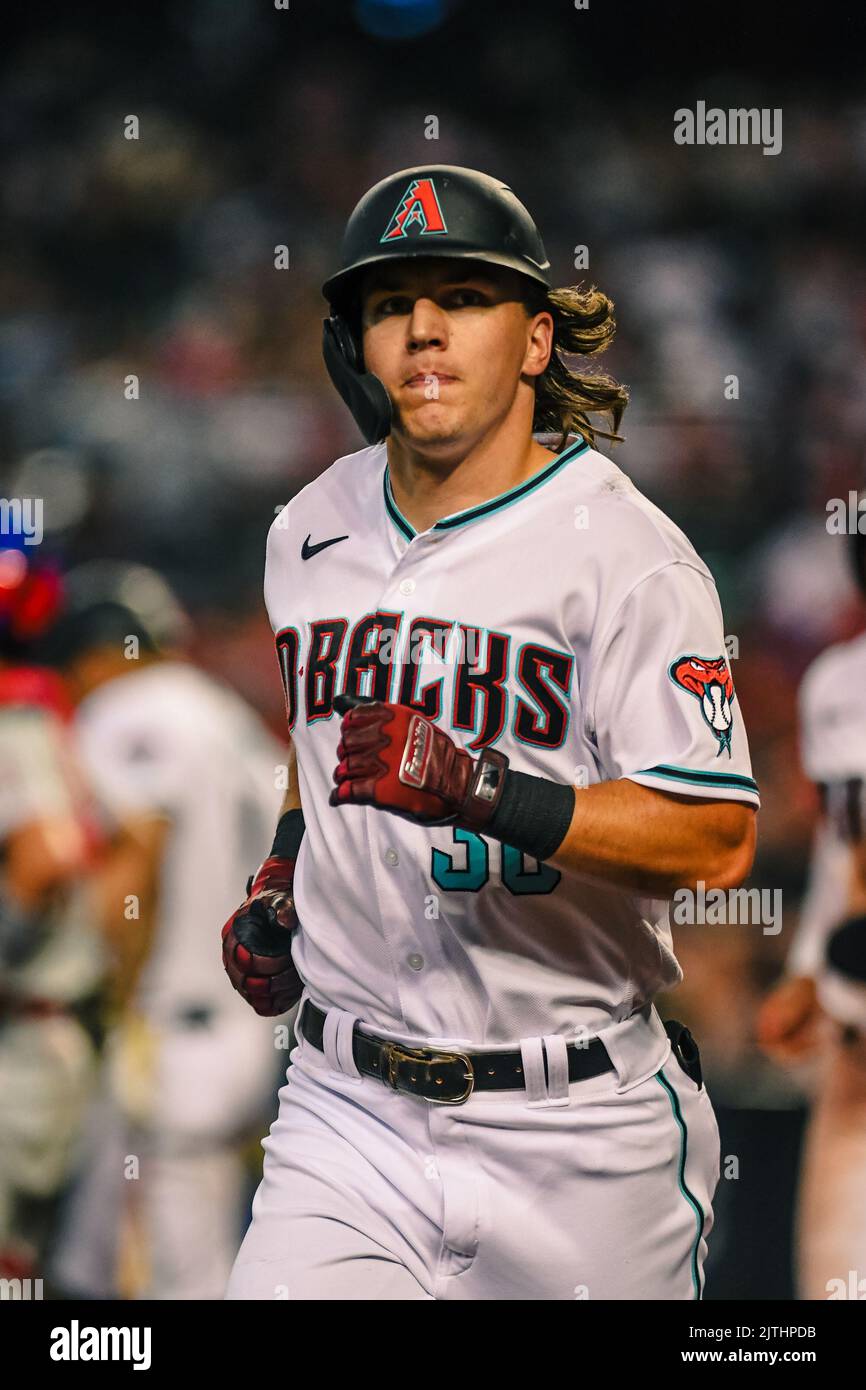 Arizona Diamondbacks désigné hitter Jake McCarthy (30) homers sur un ballon de mouche au champ droit dans le quatrième repas d'un match de baseball MLB contre le Banque D'Images