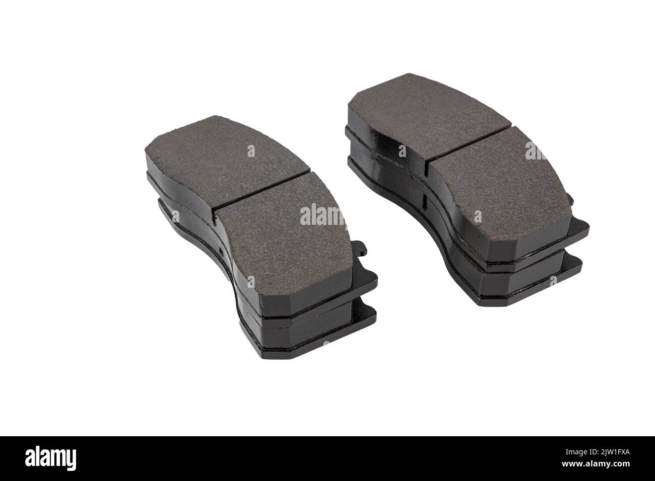 Jeu de plaquettes de frein du chariot. Pièces de frein sur fond blanc plaquettes de frein, guides, cylindres. Pièces de rechange pour l'entretien du véhicule. Banque D'Images