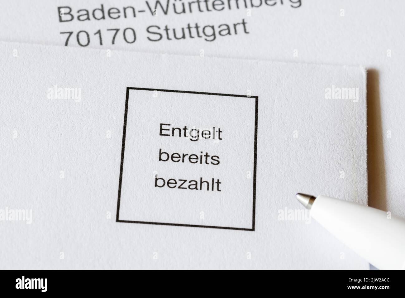 Enveloppe, inscription « rémunération déjà payée », stylo à bille Banque D'Images